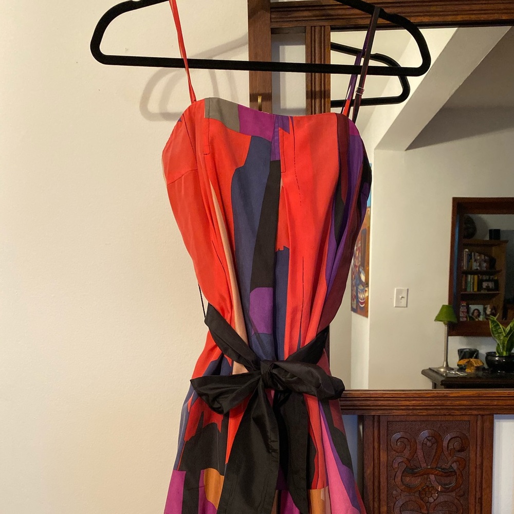 Balloon style, belted dress. 100% Silk